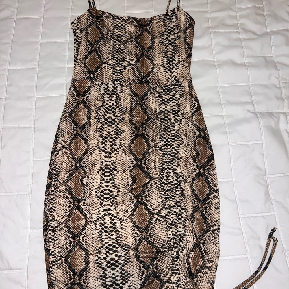 Snake print mini dress .